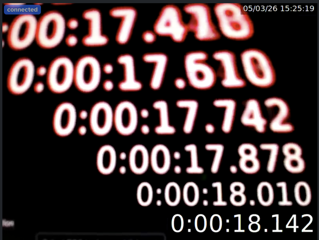 Screenshot of an infinite mirror produced by pointing camera at screen displaying camera image including a high-precision timestamp.